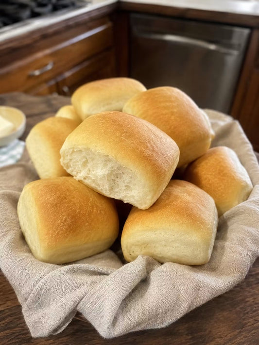 Soft homemade dinner rolls baked fresh from scratch with cinnamon honey butter