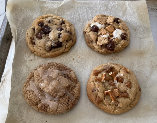 Four Little Acres bakery cookie flight with chunky chocolate chip, s’mores, cinnamon roll snickerdoodle and salted caramel pretzel cookies