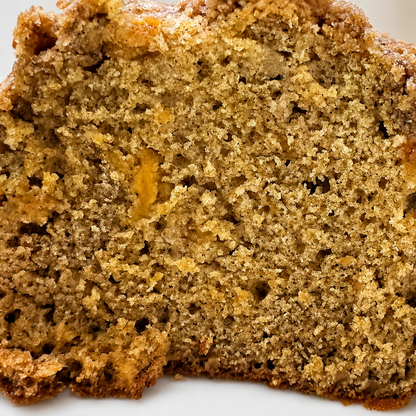 Sliced Melon Spice Loaf made with homegrown cantaloupe and brown sugar crumble